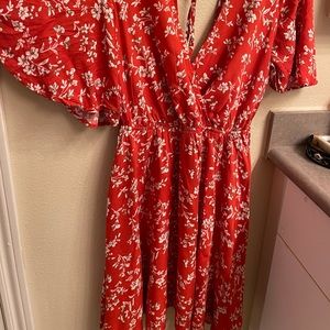 Orange v neck with string in the back